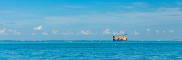 Fort boyard seen from Boyardville beach on a sunny day in Charente-Maritime, France