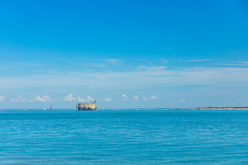 Fort boyard seen from Boyardville beach on a sunny day in Charente-Maritime, France