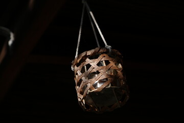 Candle hanging in the dark