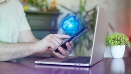 Man using smartphone with cloud computing icon. Internet technology and networking concept.