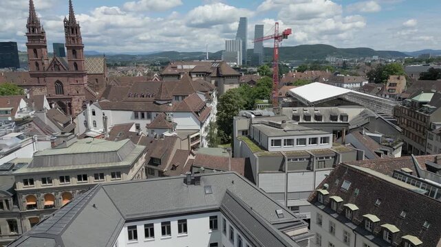 4K Drone Video of Church Bell Towers and Historic Buildings on Skyline of Basel, Switzerland (Truck Left)