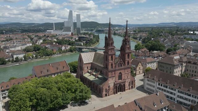 4K Drone Video of Historic Church in Basel, Switzerland with Modern Buildings in the Distance across the Rhine River