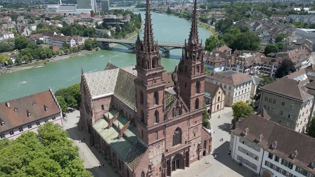 4K Drone Video of Gothic Church Entrance and Plaza in Basel, Switzerland along Rhine River (Dolly Back)