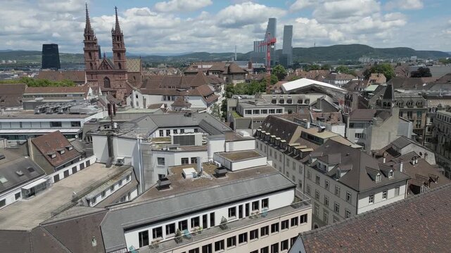 4K Drone Video of Roof Tops and Construction Cranes on Skyline of Basel, Switzerland (Dolly In)