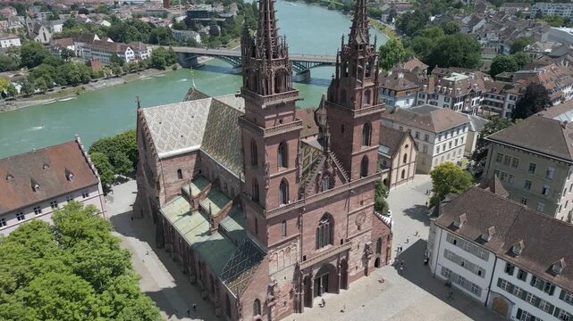 4K Drone Video of Classic Church Entrance and Plaza in Basel, Switzerland along Rhine River (Tilt Up)