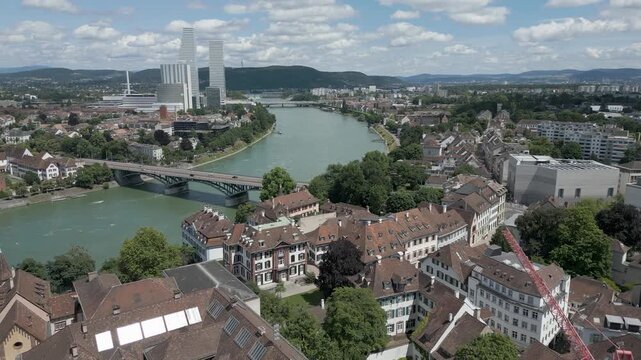 4K Drone Video of Wettsteinbr&uuml;cke Bridge over the Rhine River with Modern Skyscrapers in Basel, Switzerland (Dolly Forward)