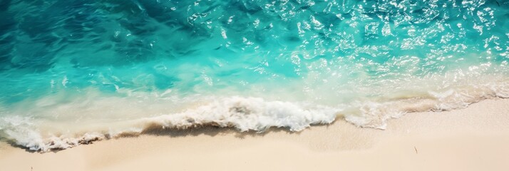 A stunning view of the turquoise ocean with gentle waves making their way to the soft sandy beach, enveloped in natural serenity.