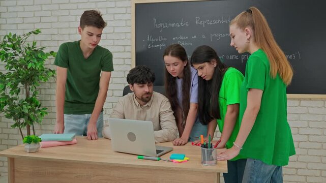 Collaborative Learning: Students Engage in Group Coding Session