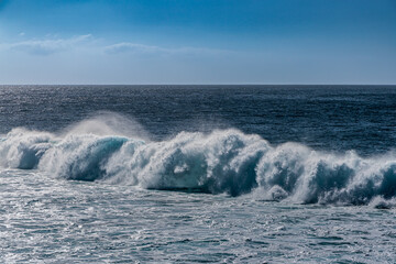 Surf waves of the ocean off the coast of the island of Lanzarote, Canary Islands
