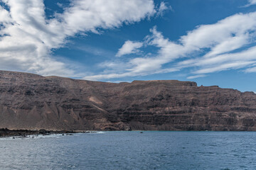 View from the boat of the northern volcanic coast of Lanzarote, Canary Islands