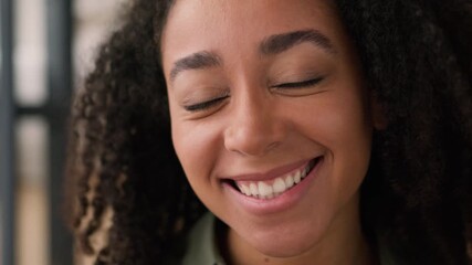 Close up smiling laughing African American woman happy face girl lady female girlfriend homeowner carefree joyful funny cheerful positive emotions laugh fun joke healthy toothy smile looking at camera