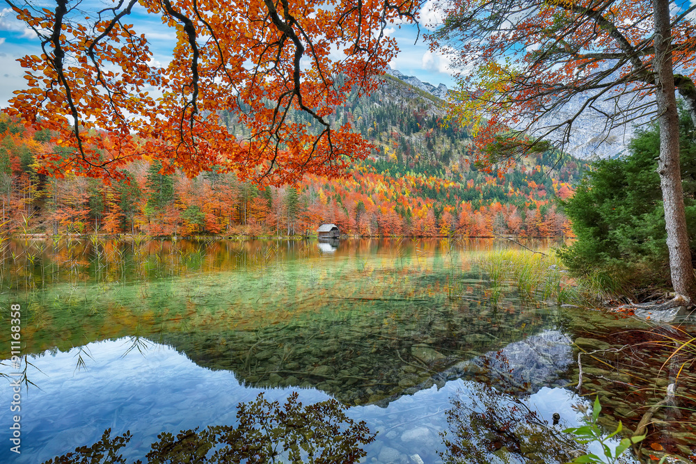 Wall mural captivating autumn scene of hinterer langbathsee lake.