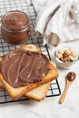 fresh toasts with chocolate paste  serve on marble table for delicious breakfast