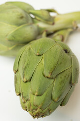 Fototapeta premium 2 artichokes on a white background