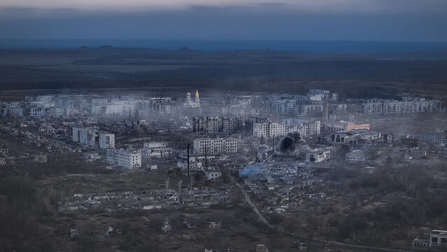 War in Ukraine aerial drone photography destroyed city in ruins because of russian invasion in European country and explosion townscape view in dramatic low lighting colors, noise pollution