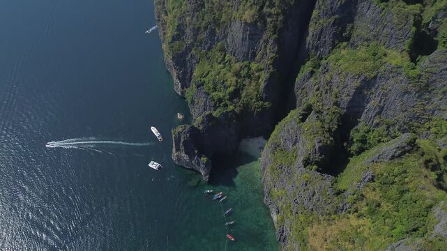 World famous Maya Bay on Phi Phi Ley island, view from high altitude of the beach and limestone cliffs
