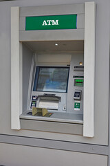 ATM standing outside on the street