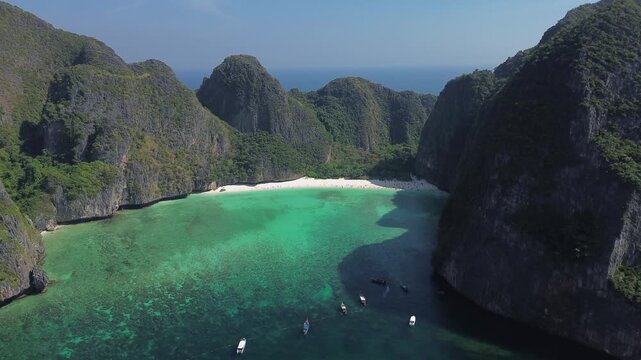 World famous Maya Bay on Phi Phi Ley island, view from high altitude of the beach and limestone cliffs