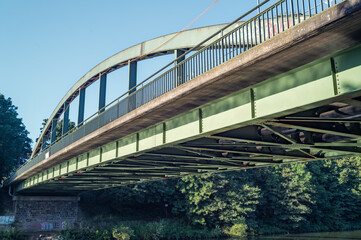 Fototapeta premium older steel road bridge over a canal