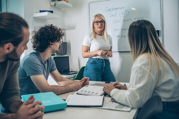 	
A language professor instructs students in foreign language at a diverse language school.	
