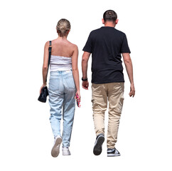 Jeune couple vu de dos marchant côte à côte, la femme en haut blanc et jean clair, l’homme en...