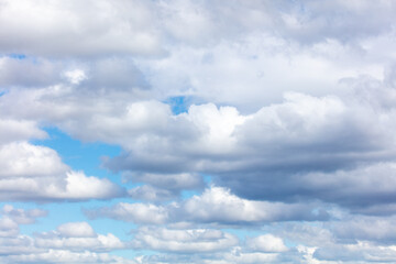 White clouds against a blue sky