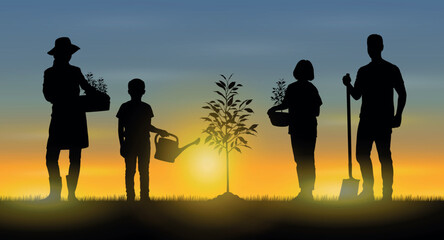 Family planting trees poses outdoor nature at evening sunset silhouettes.