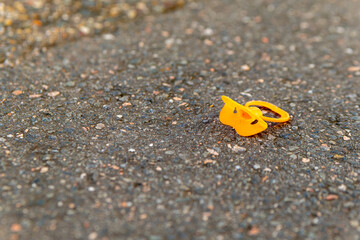 an old baby pacifier on the street