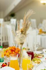 Wedding banquet in restaurant, covered round table for guests