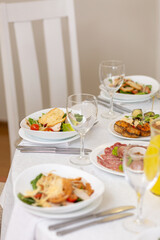 Wedding banquet in restaurant, covered round table for guests