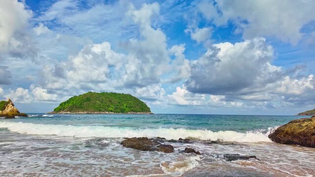Slow motion video of the waves hitting the reef along Yanui Beach. The aqua blue sea.
the clean sea and quiet with white sand beach. Amazing place of tourist attractions. Snorkeling location.
