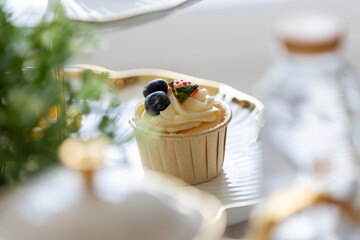 Afternoon tea is a delightful British tradition typically enjoyed between 3:30 and 5:00 PM. It consists of a light meal with a variety of finger foods, served alongside freshly brewed tea. The classic