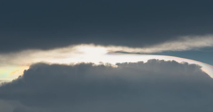 4K Time-lapse video of rain clouds moving in to block out the sun during the rainy season in Thailand. Light and Dark.