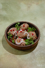 Georgian fried beef patties wrapped in fat gut - Apkhazura in clay pot