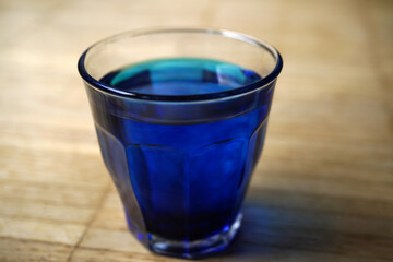 methylene blue in a glass of water