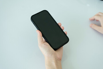 Young woman using smartphone.