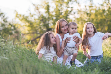 Fototapeta premium A beautiful Family Portrait captured amidst the serene beauty of Nature and greenery