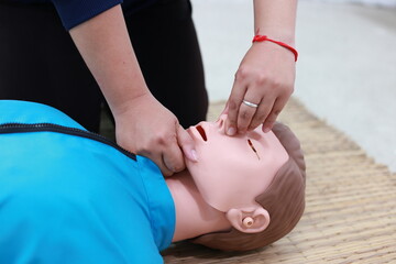 Performing CPR involves chest compressions and rescue breaths to maintain circulation and breathing...