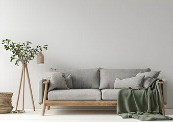 Modern interior with a gray sofa and wooden floor lamp on a white background, mockup template for product presentation. White wall background with a grey fabric couch and a green blanket.