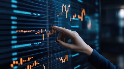 A focused business professional examines analytics on a digital interface, demonstrating expertise in data interpretation during a late evening in a contemporary workplace