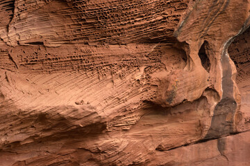 Red sandstones formations in the Areny mountain in Mont-Roig, Tarragona, Catalonia, Spain. Textures natural background.