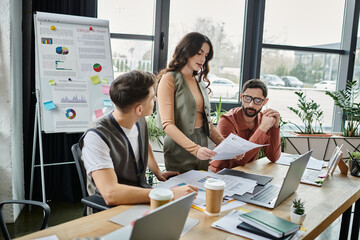 Professionals collaborate and work together in office.