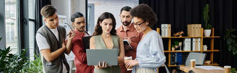 Team members engage in conversation about upcoming changes at the workplace.