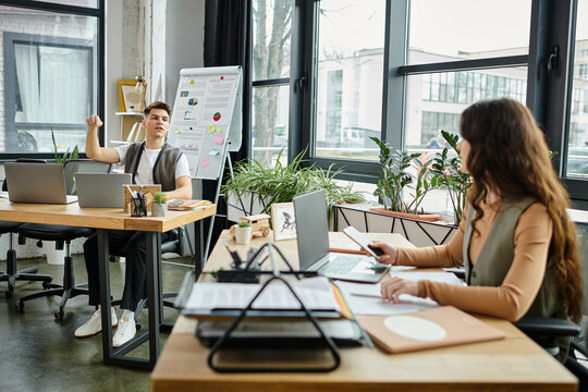 Professionals in casual elegance discuss matters in office.