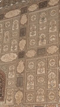 Exterior of the Wall of the Mirror Room Inside Sheesh Mahal in Amer (Amber) Palace complex. Amer, Rajasthan, India. Horizontal camera pan