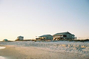 beach houses at sunset