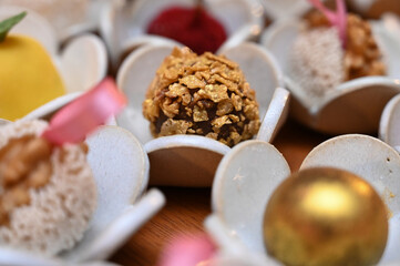 close up of candies, candies in a box, candies in a box, close up of chocolate candies, sweets background, assorted sweets, sweets table, brigadeiro, party sweets, candies, porcelain box