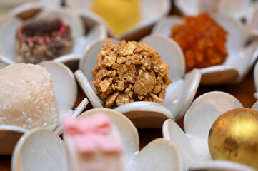 close up of candies, candies in a box, candies in a box, close up of chocolate candies, sweets...