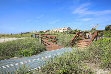 Handicap sand mat on one of the many sand dune walks on Amelia Island, Florida, USA. 