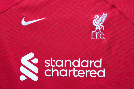 Germany, Uhingen - April 28, 2024: Red LFC jersey with the emblem of Liverpool FC, Nike and standard chartered.